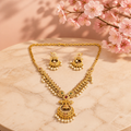Gold Toned Ad Stone Necklace and Earrings