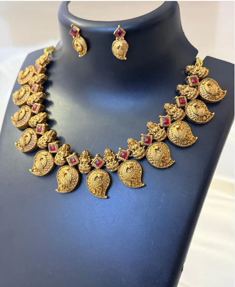 Red Mango Design Necklace Featuring Lakshmi and Peacock Motifs, with Earrings  Traditional tone
